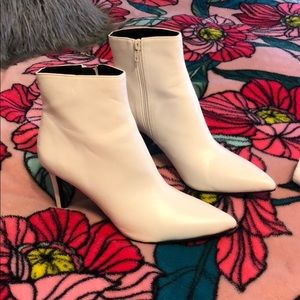 White pointy toe heeled booties